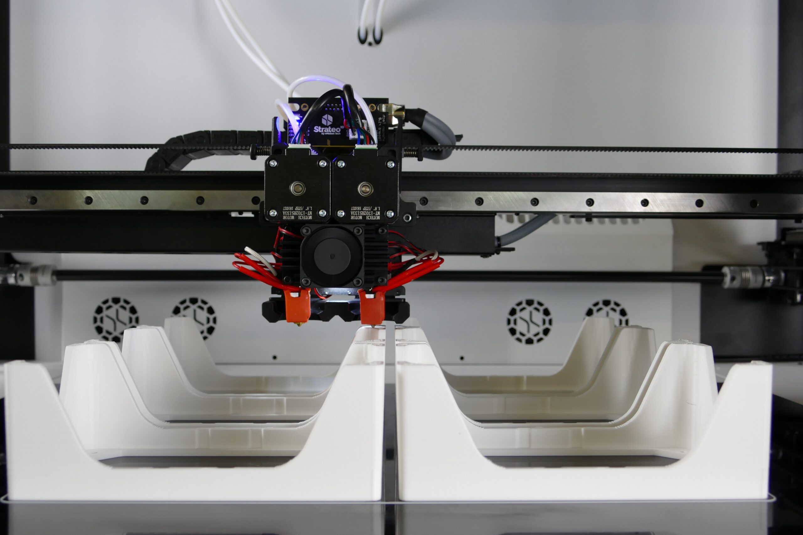 A 3D FDM printer is printing parts using from thermoplastic material